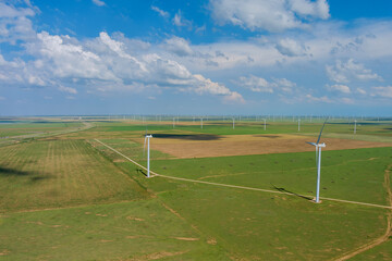 Wind turbines of many windmill renewable energy a field in Southeast Texas