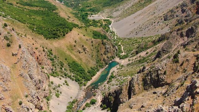 Rocky Mountains Of Ugam-​Chatkal National Park With Urungach Lake In Uzbekistan. - Aerial Drone Shot