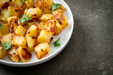 Roasted or grilled potatoes  on plate