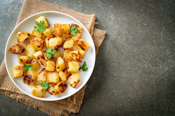 Roasted or grilled potatoes  on plate