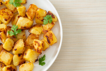 Roasted or grilled potatoes  on plate