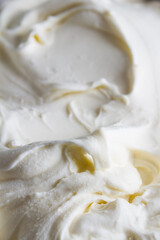 Soft vanilla ice cream close up