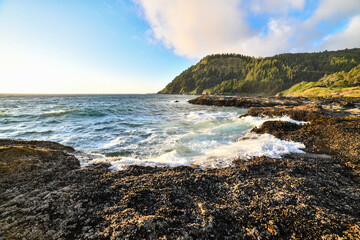 Beautiful rocky ocean bay at sunset time in Oregon, USA
