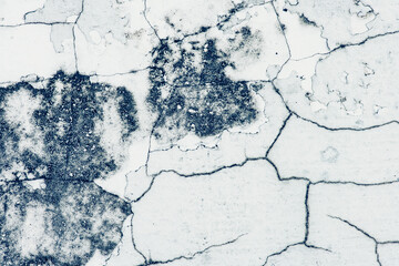 Details of cracks in the old concrete floor. soft focus.