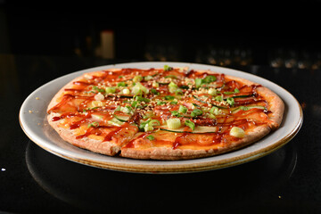 baked cheesy pizza with bbq sauce chicken and duck meat in white background western halal menu
