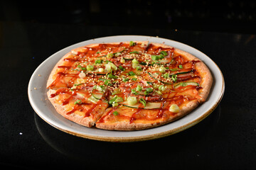 baked cheesy pizza with bbq sauce chicken and duck meat in white background western halal menu