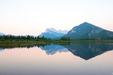 Sunset mountain reflection in lake