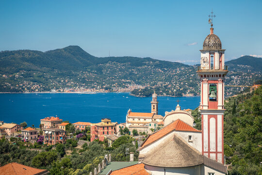 Chivari, Italy, 23 June, 2019 - view of Chiesa Sant'Andrea di Rovereto at Chiavari, Portofino area visible on the horizon.