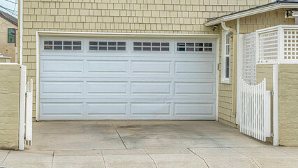 Pano Front view of residential garage in a neighborhood in Long Beach California