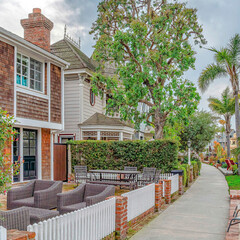 Fototapeta na wymiar Square Picture perfect coastal neighborhood in Long Beach California on a cloudy day