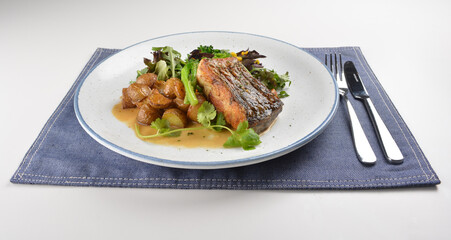 pan fried bbq fresh cod, salmon, grouper fish fillet in chef sauce with potato, corn and vegetables western halal menu