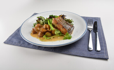 pan fried bbq fresh cod, salmon, grouper fish fillet in chef sauce with potato, corn and vegetables western halal menu