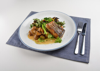 pan fried bbq fresh cod, salmon, grouper fish fillet in chef sauce with potato, corn and vegetables western halal menu