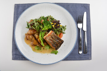 pan fried bbq fresh cod, salmon, grouper fish fillet in chef sauce with potato, corn and vegetables western halal menu