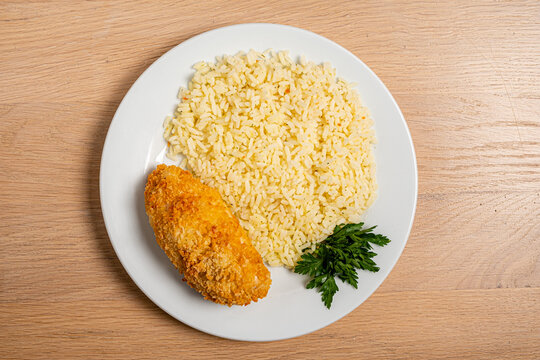 chicken cutlet wiht rice and herbs