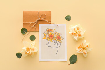 Beautiful greeting card, envelope and narcissus flowers on color background