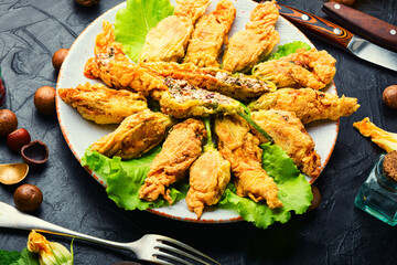 Stuffed zucchini or courgette flowers