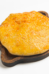 Vanilla cream dessert with sour cream and fresh organic strawberry. Served in a traditional bowl.