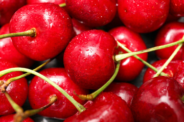 Heap of tasty cherries as background