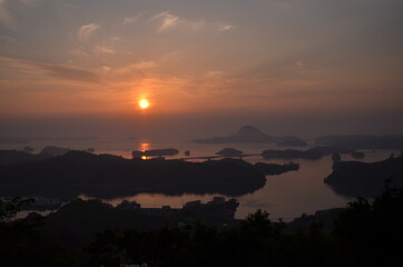 orange sunset ocean view islands drop 