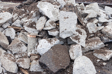 A mixture of concrete, asphalt and earth