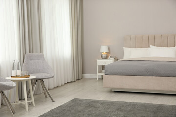 Beautiful hotel room interior with double bed