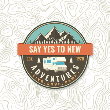 Say yes to new adventures. Live, love, camp. Patch or sticker. Vector Concept for shirt or logo, print, stamp or tee. Vintage typography design with camper trailer and mountain silhouette