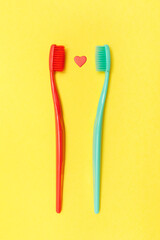 Teeth hygiene and oral dental care products. Taking care of your health. Dental floss. Dental toothbrushes. Vertical.