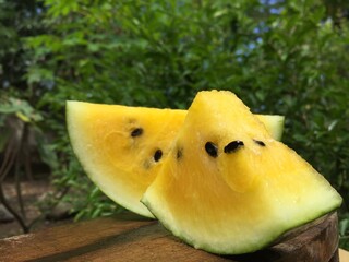 Fresh yellow watermelon slice in, juicy delicious round watermelon with yellow core