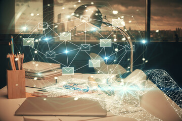 Multi exposure of envelops drawings and office interior background. E-mail concept.