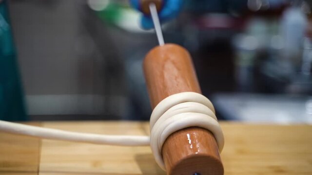 sweet dough tube. dessert is prepared on the shelves in the cafe