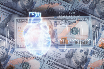 Double exposure of heart drawing over usa dollars bill background. Concept of medical education.