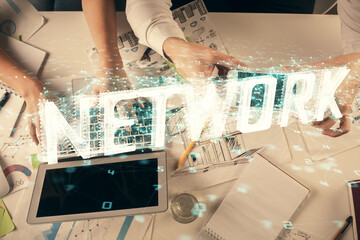 Double exposure of man and woman working together and data theme hologram drawing. Computer background. Top View.