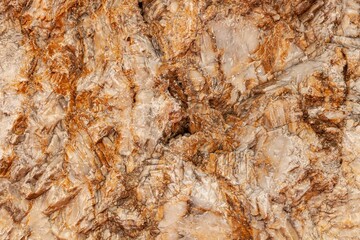 Natural stone with brown rough baking stone from garden decoration stone texture and background seamless