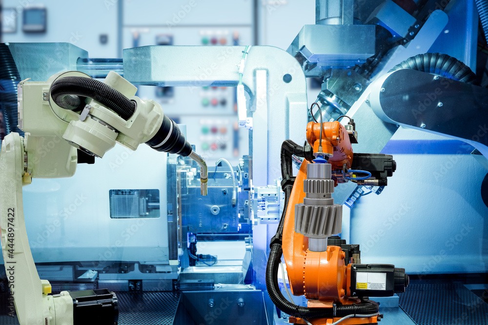 Poster industrial welding robotic working with metal cog from gripping robot on smart factory, blue tone co