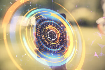 Double exposure of tech icon hologram and woman holding and using a mobile device. Technology concept.