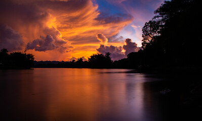 Sunset on Kanchanaburi River Khwae Yai or Kwai in Thailand