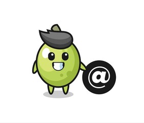 Cartoon Illustration of olive standing beside the At symbol