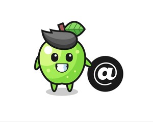 Cartoon Illustration of green apple standing beside the At symbol