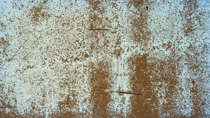 An old destroyed wall with cracks and scratches. Abstract grunge background texture for design posters, advertising and more.