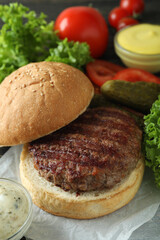 Concept of cooking burger with burger ingredients, closeup