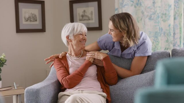 Happy senior woman with daughter