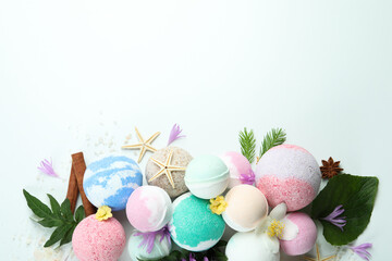 Different bath balls on white background, space for text