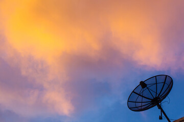 Silhouette satellite Dish on Twilight sky Background.