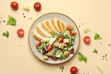 Concept of tasty eating with Caesar salad on beige background