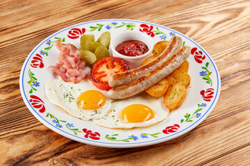 traditional breakfast with egg and sausage