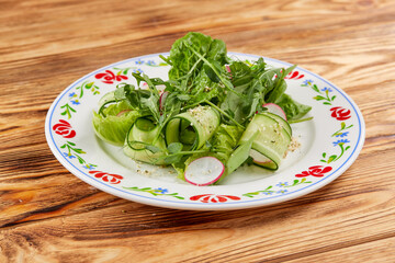 fresh salad on the wooden background