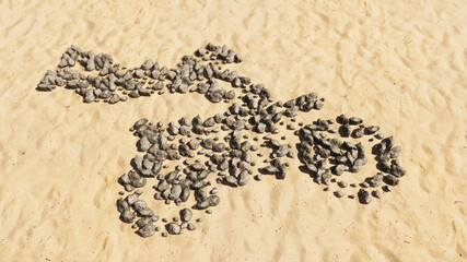 Concept conceptual stones on beach sand handmade symbol shape, golden sandy background, motorcycle stuntman sign. 3d illustration metaphor for sport, adrenaline, extreme competition, danger and fun