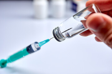  Vaccine in vial with syringe