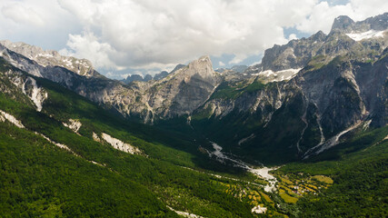 Fototapeta premium Spring morning at mountains and clouds